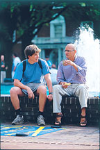 Dr. Tom Arcaro talks with a student