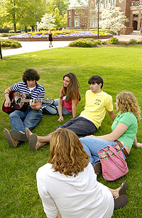 Student playing guitar
