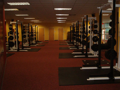 View of racks used for squatting and benching