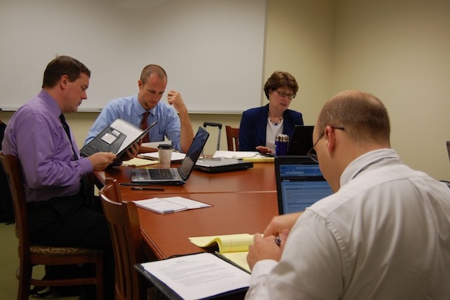 Students in Elon Law's Wills Clinic review documents with Professor Margaret Kantlehner