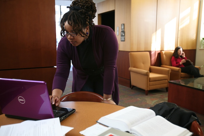 Elon Law student working on computer