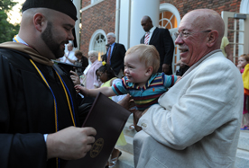Photo of proud parents during commencement ceremonies.
