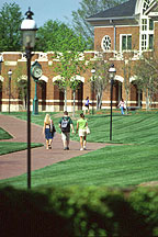 Photo of students walking toward Belk Library.