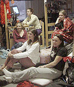 Photo of Elon University students in a dorm room.