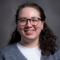 Headshot of Alexis Goslen.