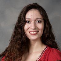 Headshot of <strong>Outstanding Staff Member</strong>.