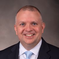 Headshot of Brooks Depro.