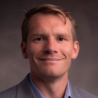 Headshot of William Evans.