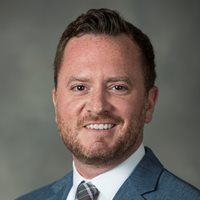 Headshot of Brian Lyons.