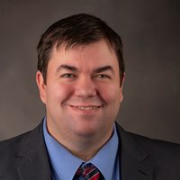 Headshot of Chris Nelson.