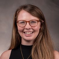 Headshot of Caroline Sprecher.
