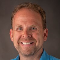 Headshot of David Higham.