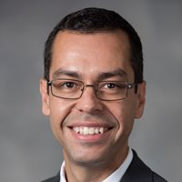 Headshot of David Moura.