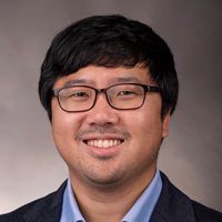 Headshot of Hyunuk Kim.