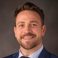 Headshot of Mustafa Akben.