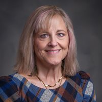 Headshot of Melissa McBane.