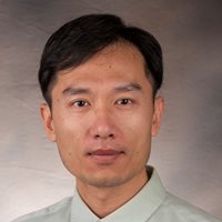 Headshot of Su Dong.