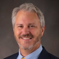 Headshot of Scott Oakes, MBA.