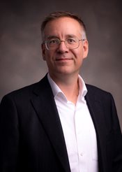 Headshot of Adam Aiken