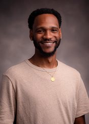 Headshot of Abdul-Malik Harrison