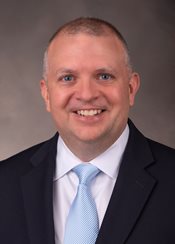 Headshot of Brooks Depro