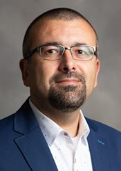 Headshot of Baris Kesgin