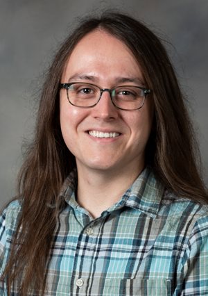 Headshot of Cristian Albee