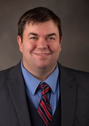 Headshot of Chris Nelson