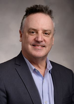 Headshot of Alan Buck