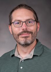 Headshot of Eric Bauer