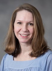 Headshot of Elisha Savchak-Trogdon