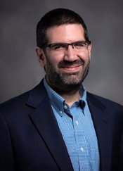 Headshot of Geoffrey Claussen