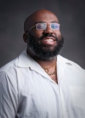Headshot of Charles Evans