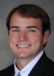 Headshot of John Gardner