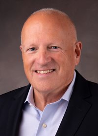 Headshot of Leo M. Lambert .