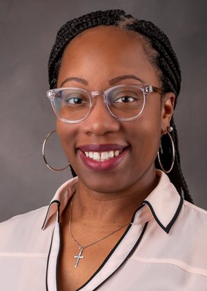 Headshot of Malia Brown