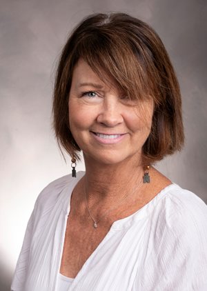 Headshot of Maggie Mullikin