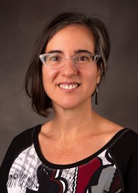 Headshot of Nina Namaste.