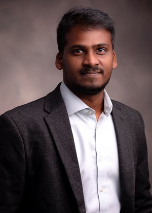 Headshot of Vinayaka Gude