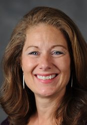 Headshot of Virginia Novine-Whittaker