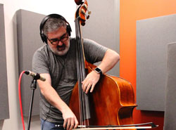 Picture of Todd Coleman playing a double bass.