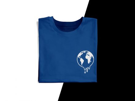 Photo of a blue tshirt with globe on it.