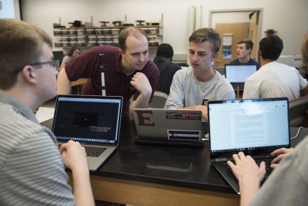 Benjamin Evans, Associate Professor of Physics, teaches a lab in McMichael Science Building.
