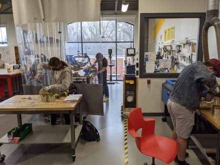 Students build rocket stoves at the Maker Hub