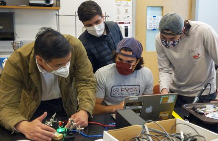 Assistant Professor of Engineering Jonathan Su works with Eduardo Gonzalez '21, Matthew Del Valle '21 and Sohan Hess '21 to fine tune the team's optical sensor.
