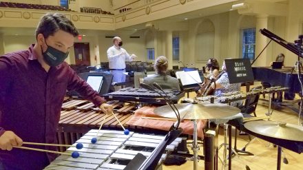 Brandon West, Fire of the Carolinas Marching Band percussion director, plays vibraphone during a Sept. 12 rehearsal of the Elon Contemporary Chamber Ensemble in Whitley Auditorium.