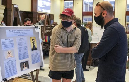 Riley Gibson '23 discusses his research project examining drag in theatrical design Tuesday, Nov. 16, 2021 in the Great Hall.