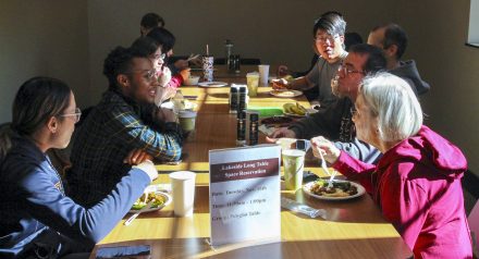 Students and faculty enjoy a meal and conversation at the Polyglot Lunch tables in Lakeside Dining Hall on Nov. 16.